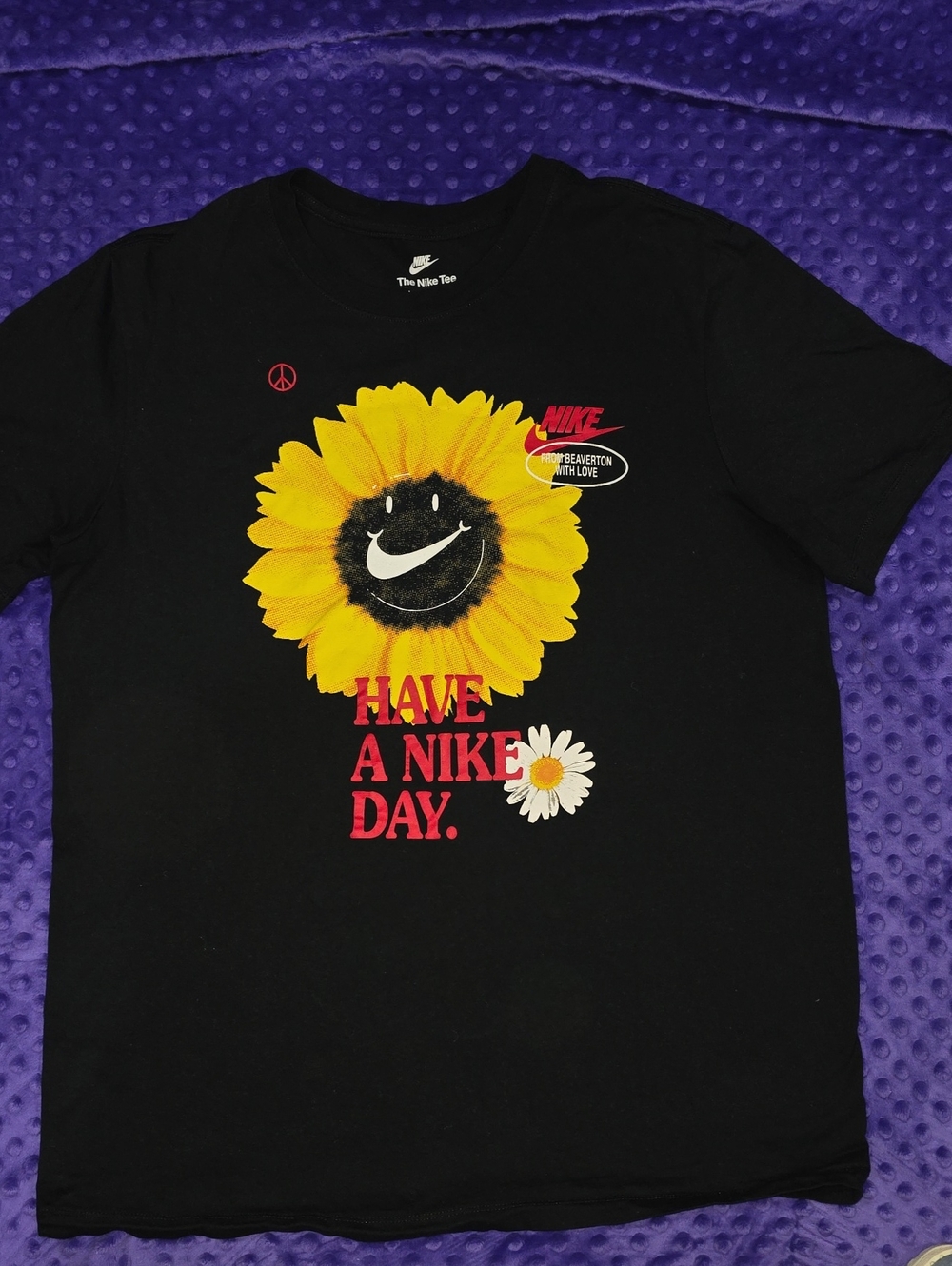 Nike Black Short-Sleeve Sunflower Graphic Tee with Red Text